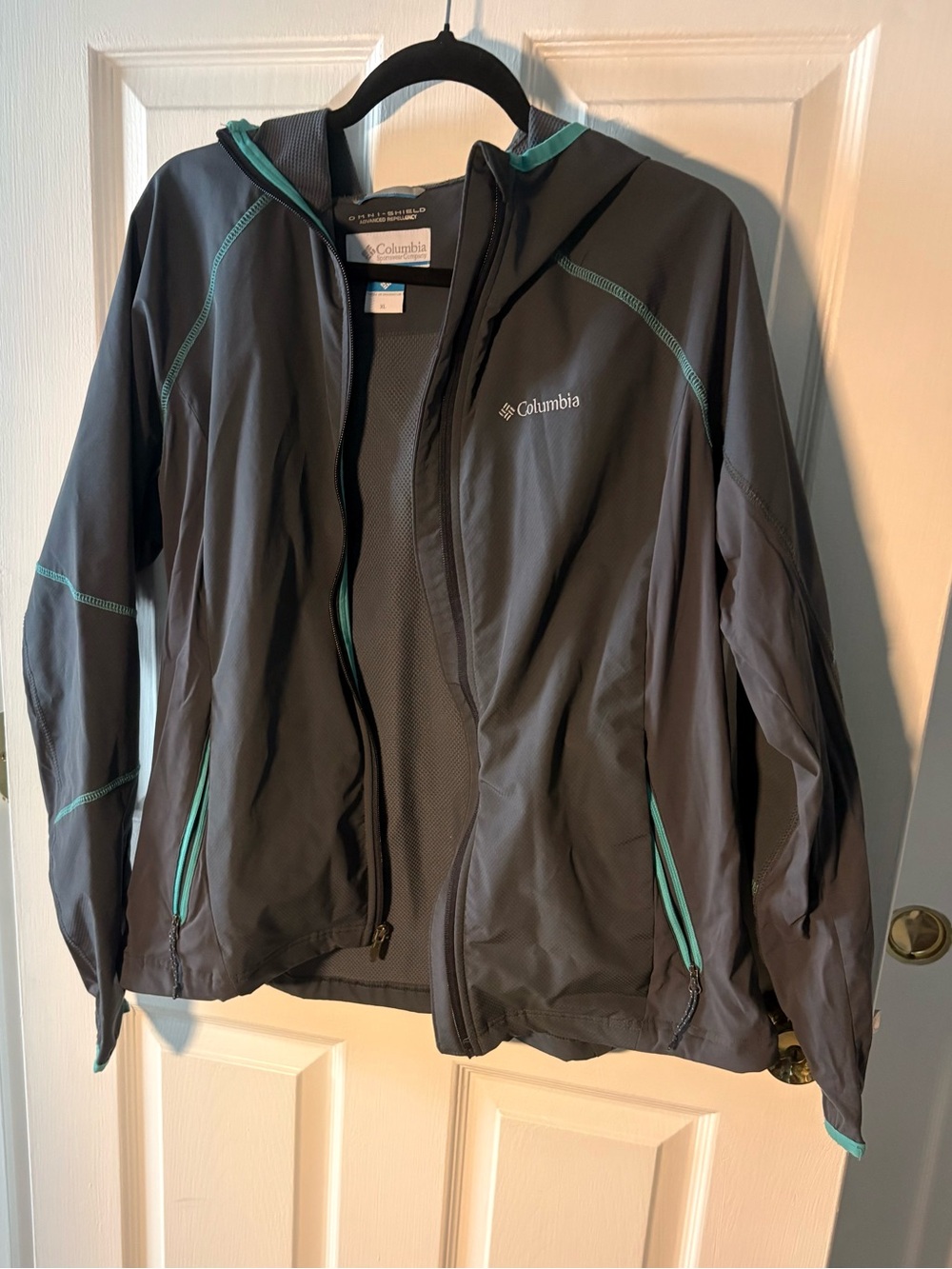 Columbia Omni-Shield Woman’s Charcoal Rain Jacket with Teal Trim